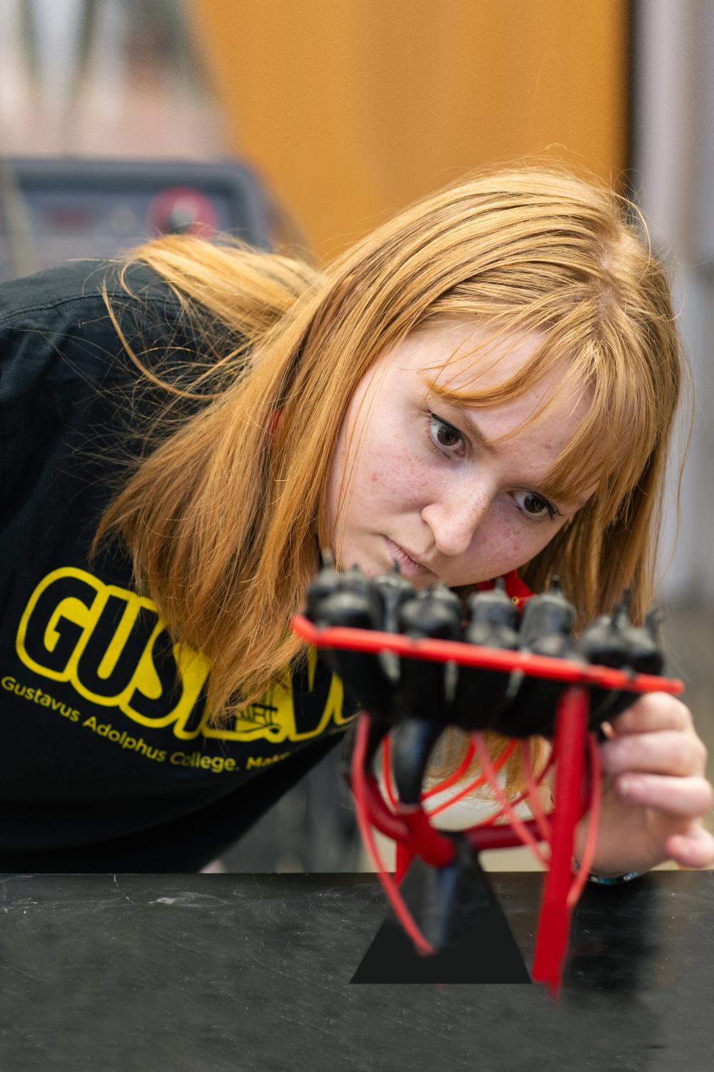 student working on a sculpture