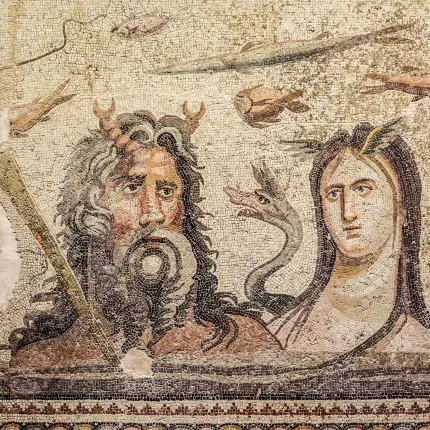 A male god with horns, long hair and beard and a long haired goddess with wings growing from her temples surrounded by fish