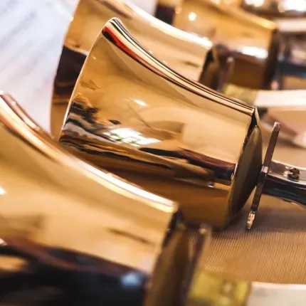 Brass handbells on a table