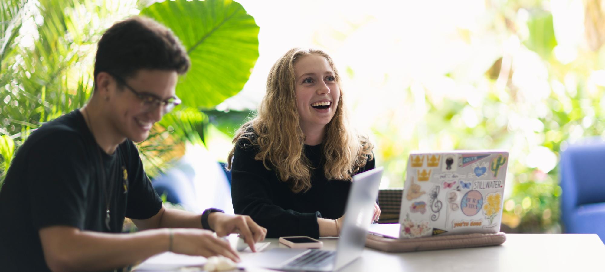 2 students study in olin hall