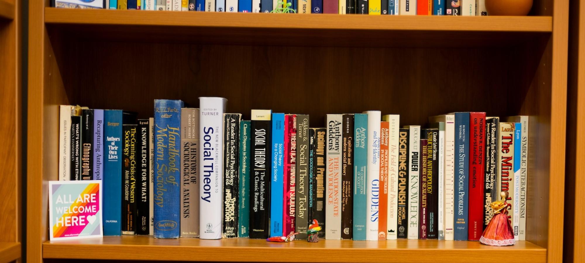 The books on the bookshelf of a sociology professor at Gustavus Adolphus College.