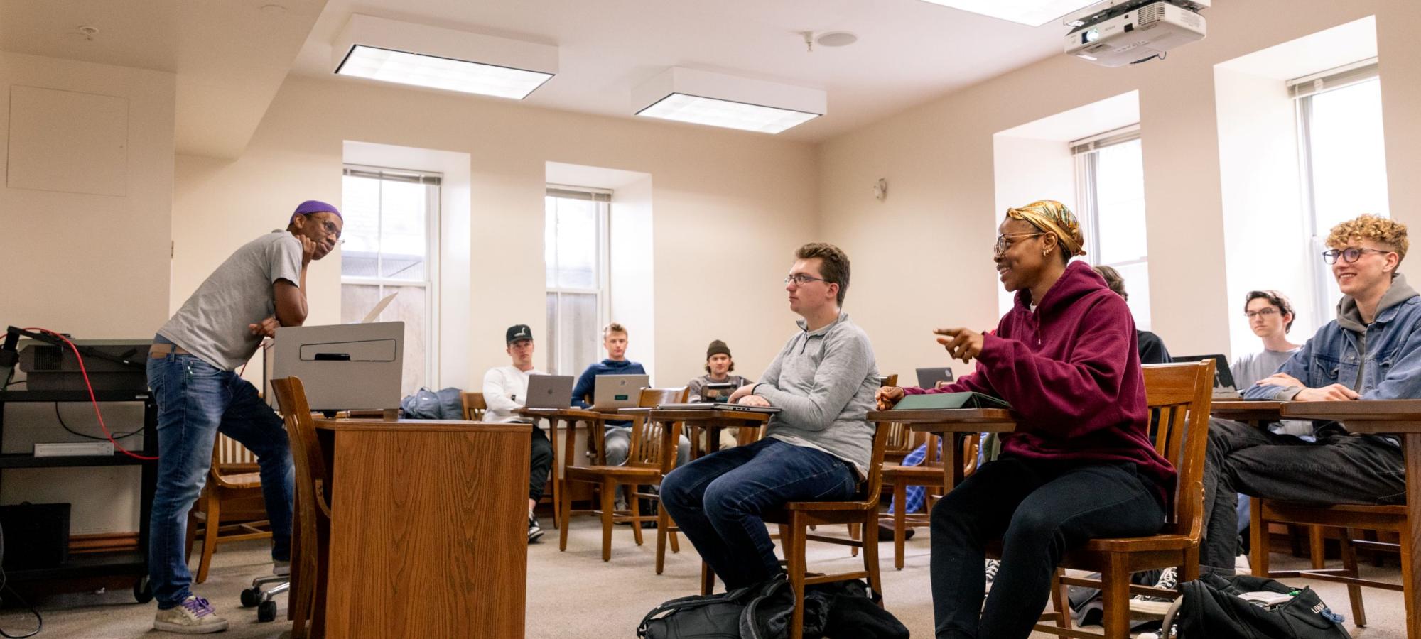 philosophy class with student and faculty