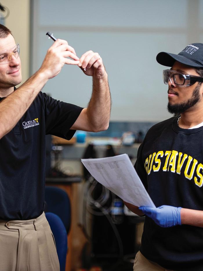 Professor with student in lab