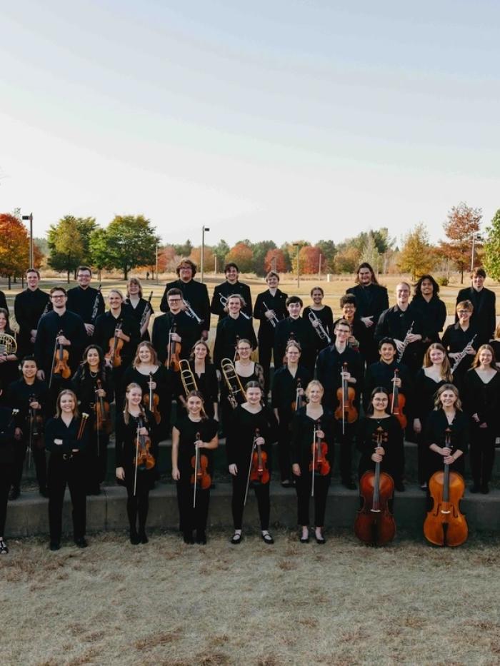 Gustie orchestra playing outside