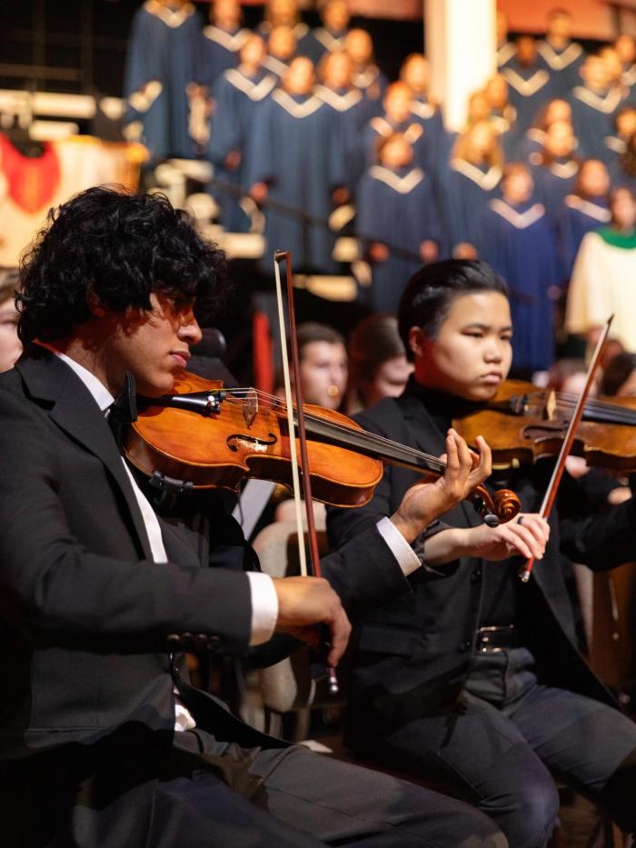 students playing violins