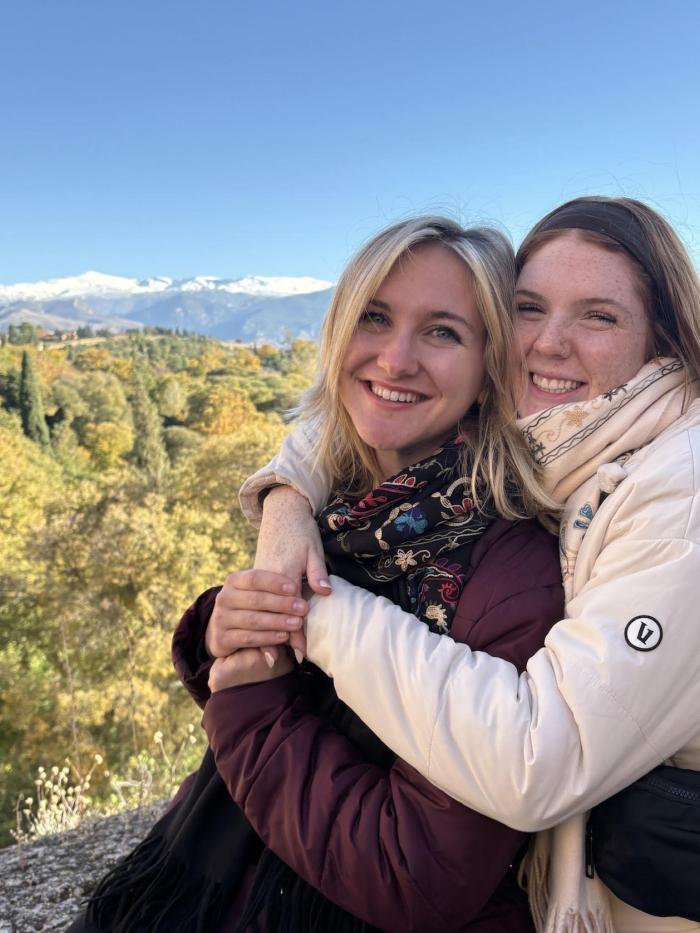 two students hugging in granada spain